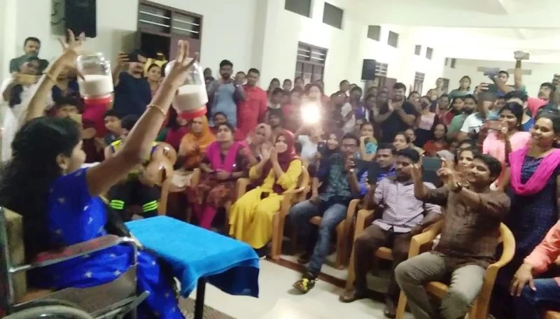 Anju Rani Joy Paraplegic Multi-Talented Woman 5 Anju Jar Lifting Audience
