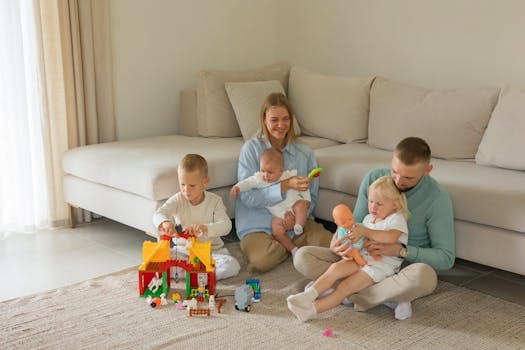 Parenthood Reshapes Married Life: Why Having Kids Strengthens Your Relationship? 3 A cheerful family enjoying playtime with toys in a modern living room setting.