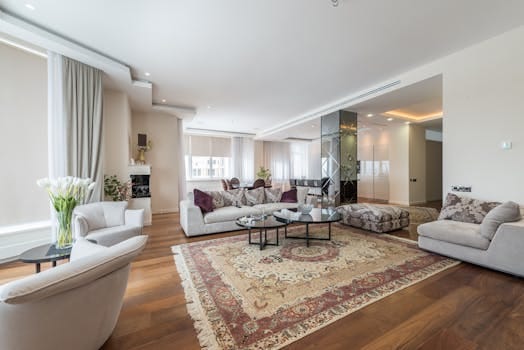 The True Essence of a Home: Why Love Matters More Than Size 4 Spacious, modern living room with elegant decor and plush furniture.