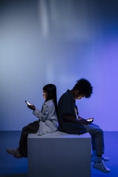 Modern Generation Children | Are We Raising Responsible Children? 3 Children sitting back to back using smartphones, illuminated by screen light in a dark, minimal studio setting.