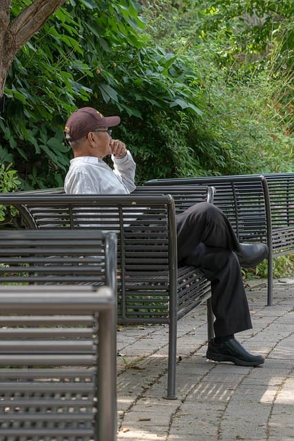 The Hidden Power of Stillness: Why Doing Nothing Can Change Everything 3 man sitting on bench, thinking, man, alone, person, bench, park, sitting, back, gray thinking, gray alone, gray think