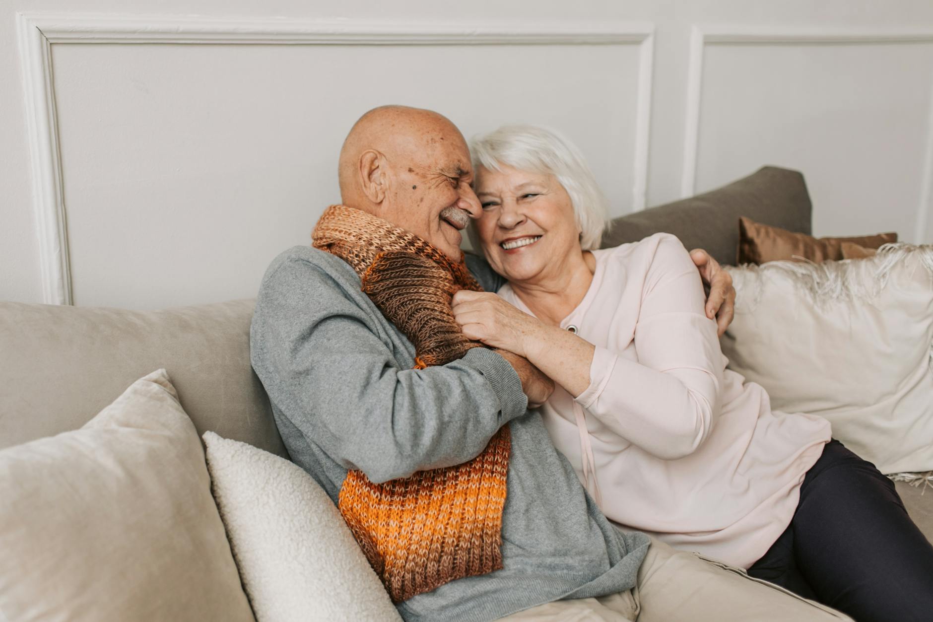 Practising Love in Real Life: The Power That Transforms Hearts and Lives 5 man in gray sweater hugging woman beside him