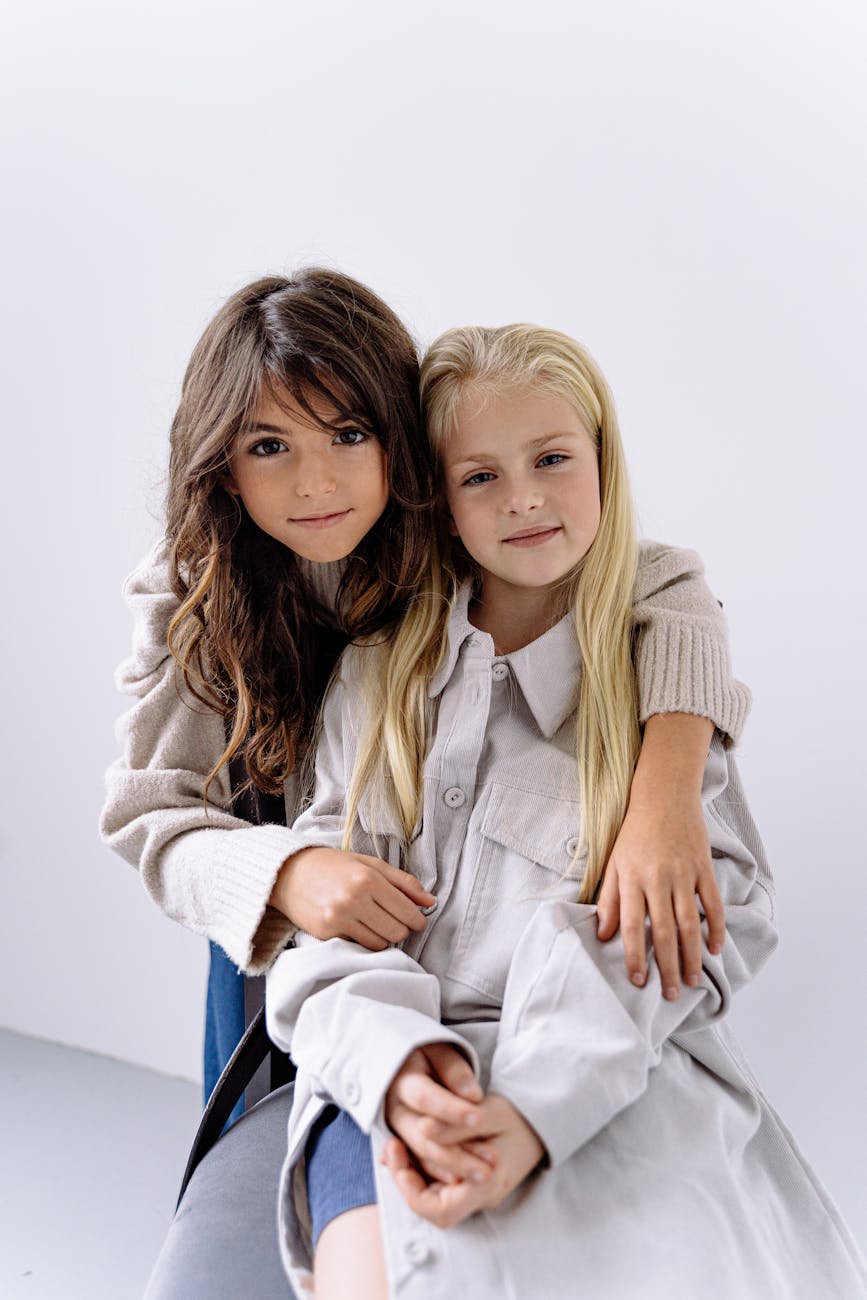 How to Strengthen the Sibling Bond | Practical Ways for a Peaceful and Loving Home 3 two girls wearing oversize clothes