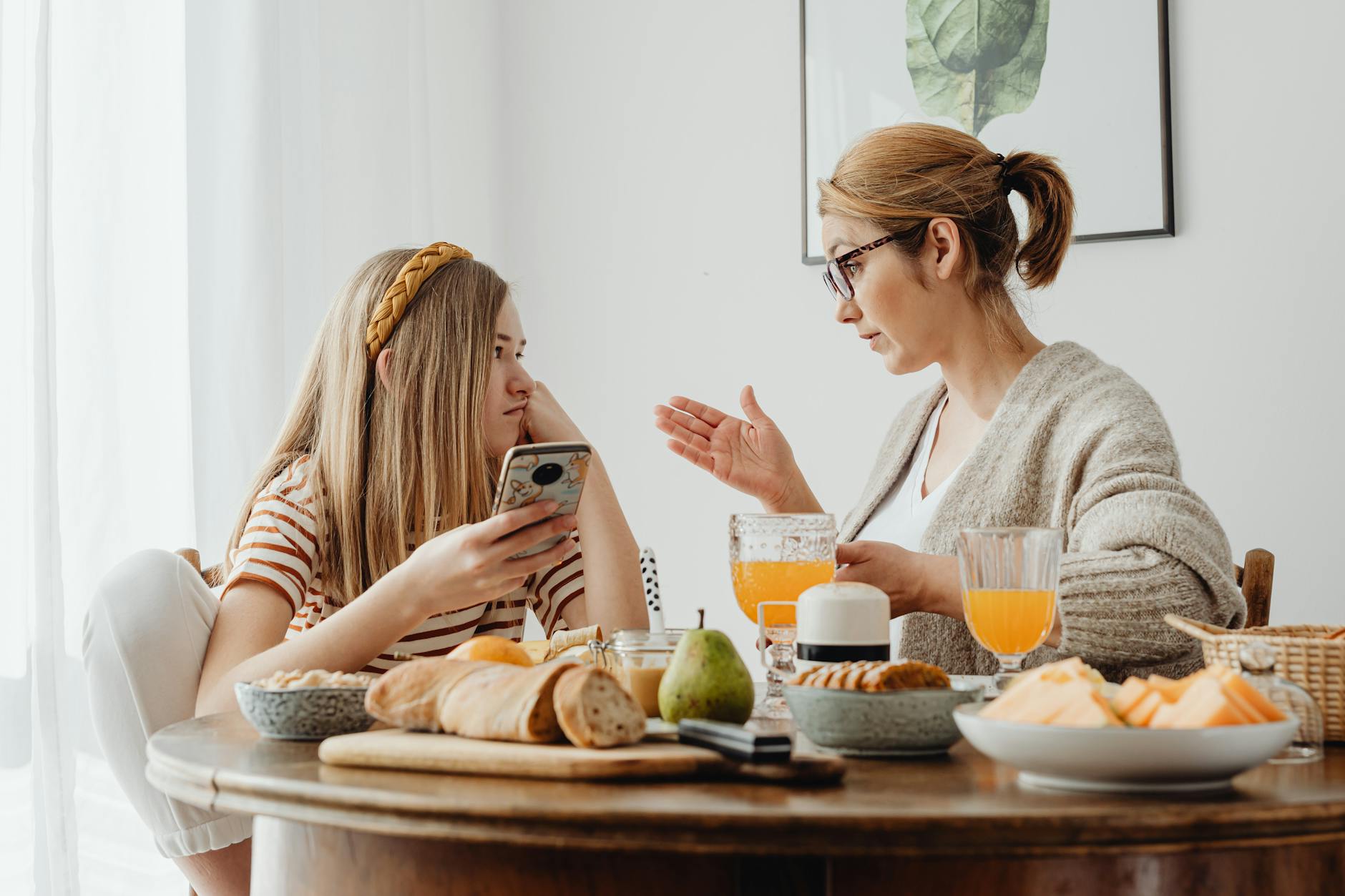 mother talking to her daughter