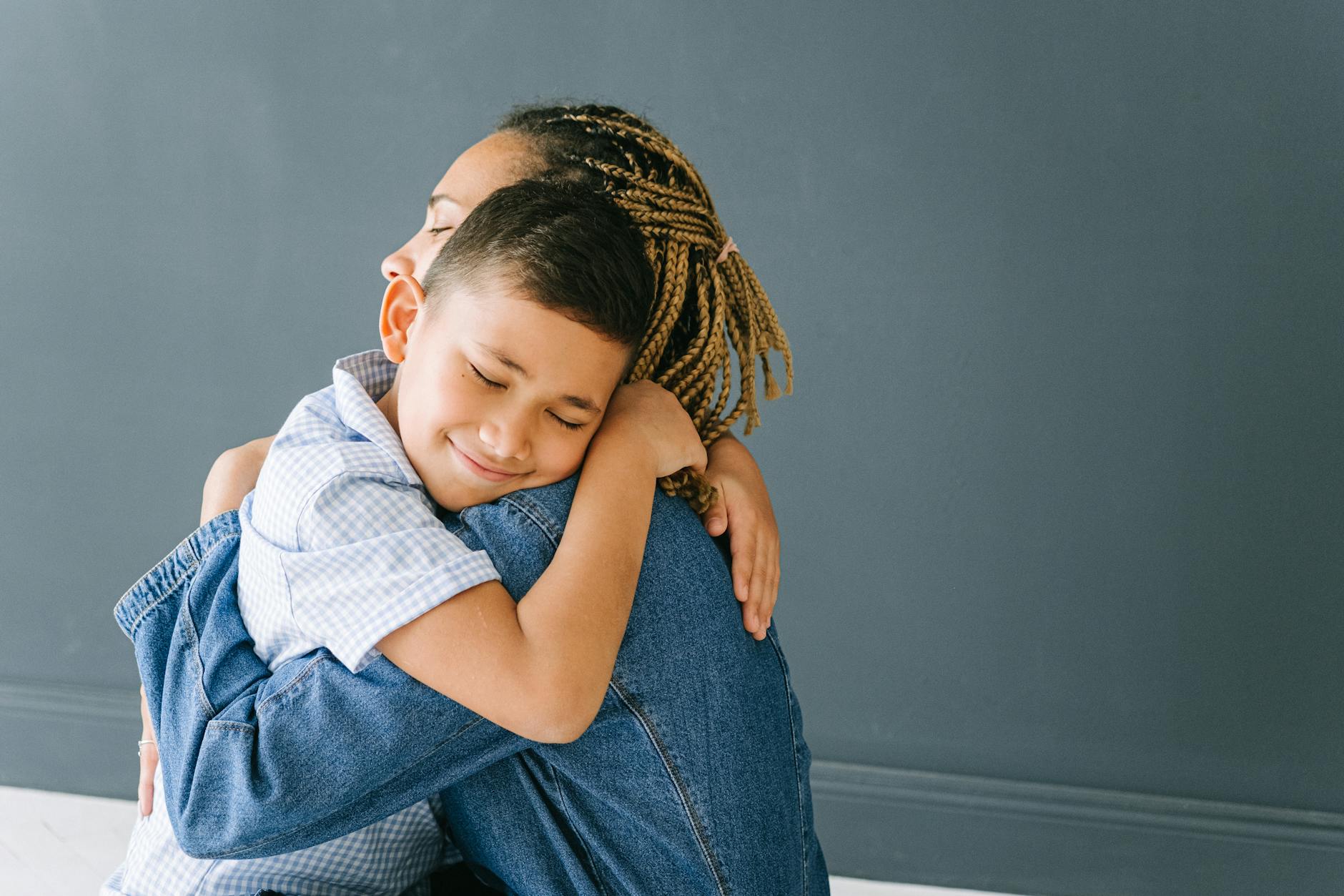 Low Frustration Tolerance in Children: Understanding the Root Cause and Building Resilience 4 mother and son hugging