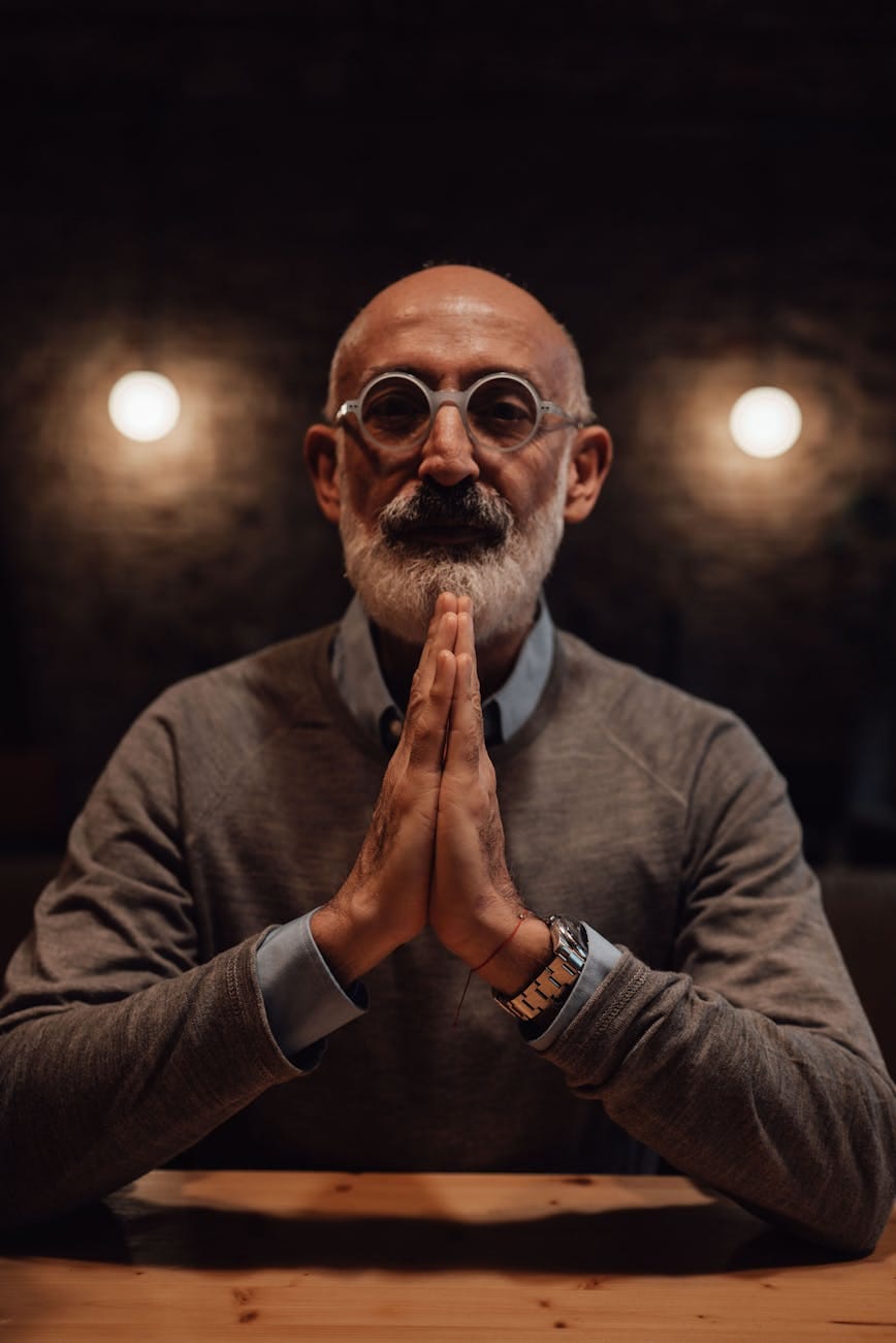 Staying Humble | What It Is, Why It Matters, and How It Benefits You 3 mature bearded man at table