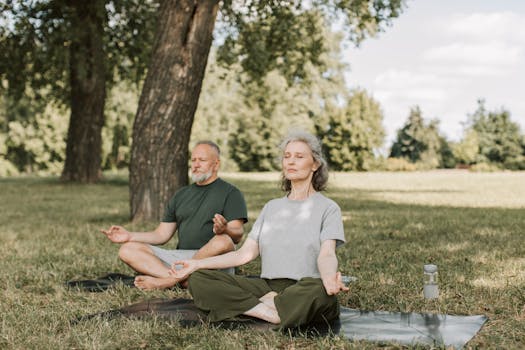 Healthy Morning Routine for Seniors | Science-Backed Habits That Add Strength, Energy, and Long Life 7 Senior couple meditating on yoga mats outdoors, embracing a healthy lifestyle.