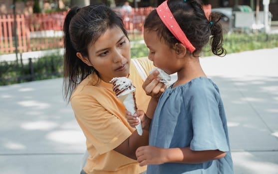 Parental Attention and Child Emotional Needs | Signs, Impact, and Parenting Guide 3 Ethnic caring mother wiping face of adorable crop daughter with sweet tasty ice cream cone